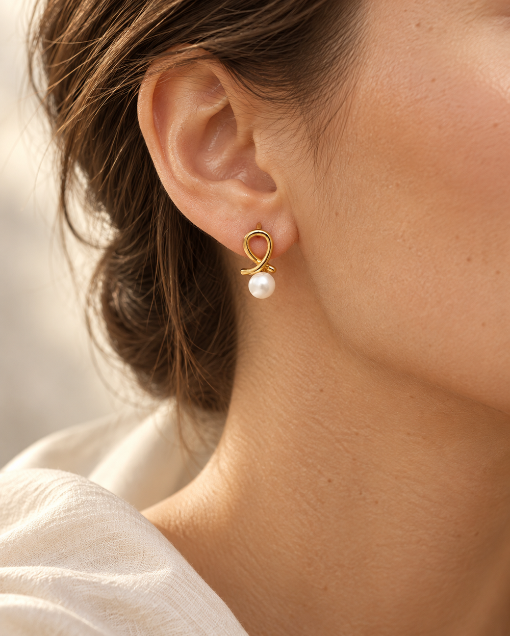 
Nodo Pearl Drop Earrings